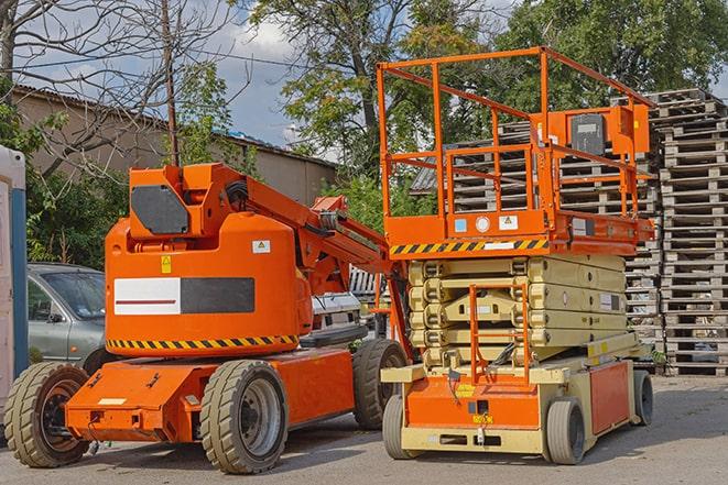 forklift operator organizing inventory in warehouse in Davie